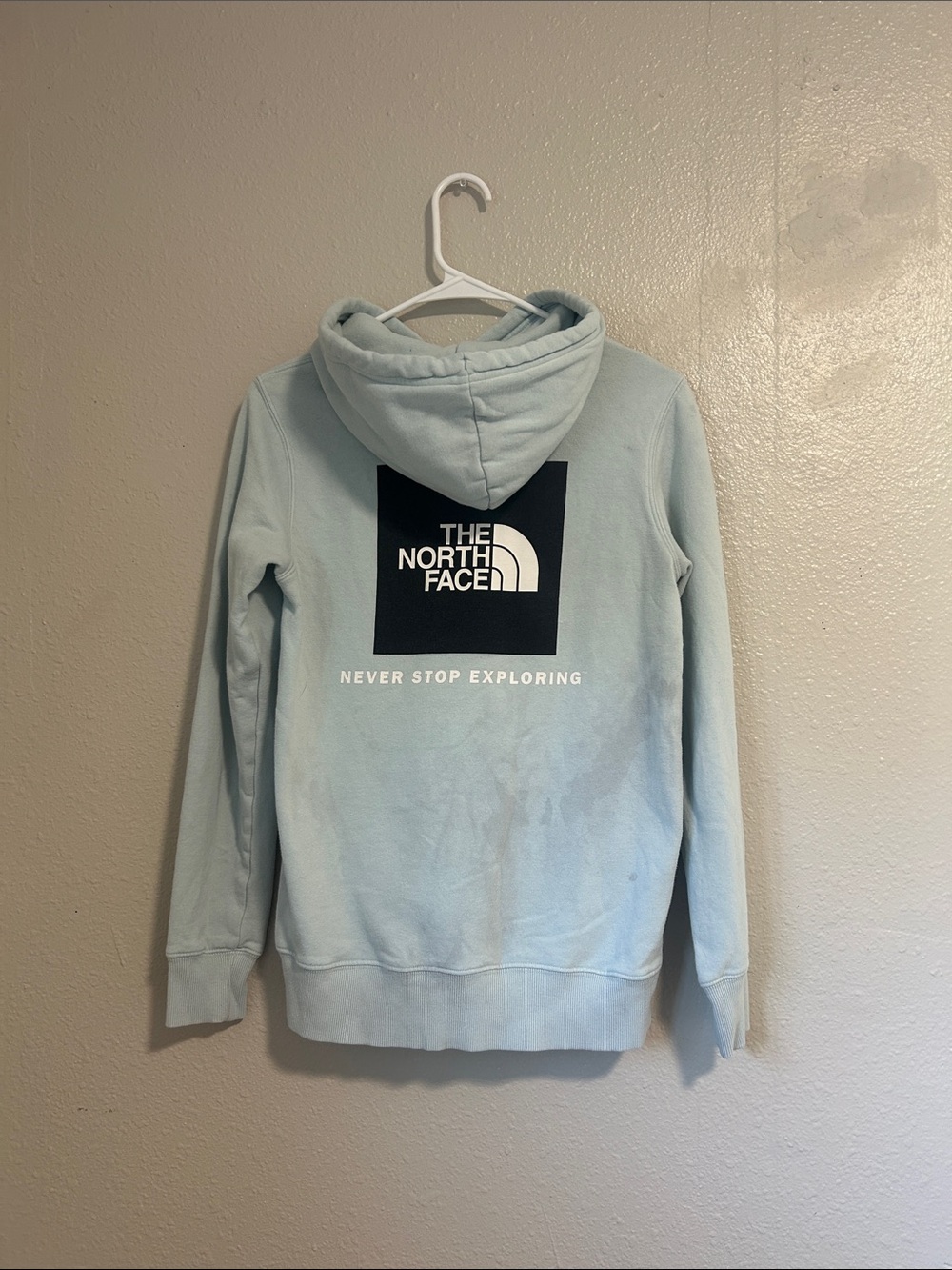 The North Face Men’s Light Blue Crewneck Hoodie with Black Logo